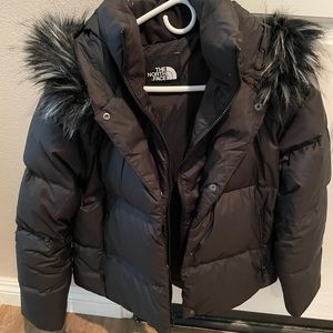 The North Face black puffer jacket in size medium